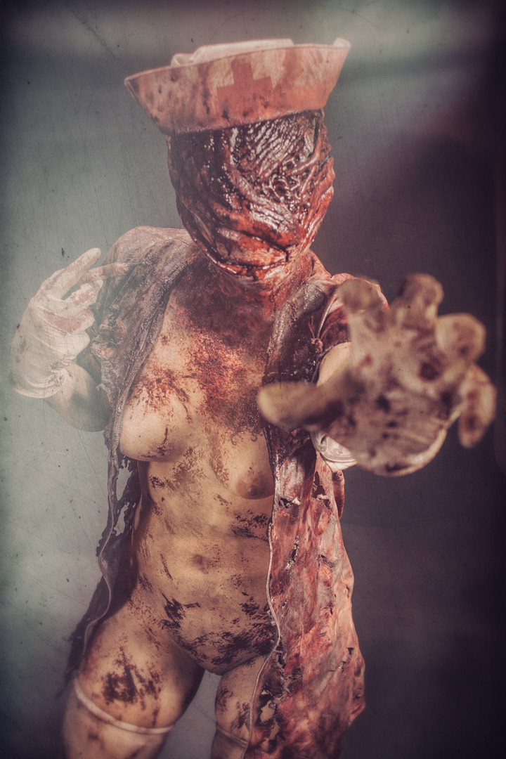 1girls, areolae, blood, breasts, clothes, cosplay, female, female only, gloves, legs, looking at viewer, medium breasts, nipples, nurse, nurse (silent hill), nurse cap, open clothes, photo, pussy, silent hill, silent hill (film), solo, standing, stomach, thighs, white gloves
