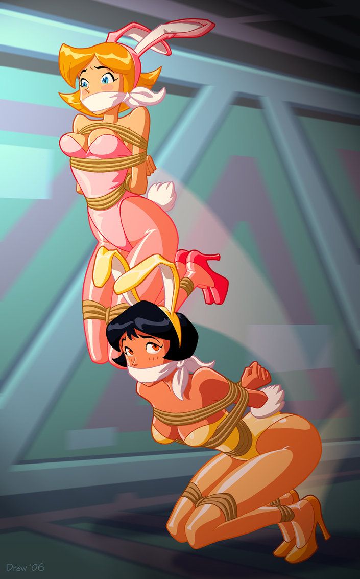 2006, 2girls, alex (totally spies), animal ears, arms behind back, ass, bent over, black hair, blonde hair, blue eyes, blush, bondage, bound, breasts, bunny ears, bunny tail, bunnysuit, cleavage, clover (totally spies), dark skin, dark-skinned female, drew gardner, female, female only, femsub, fully clothed, gag, gagged, high heels, leotard, medium breasts, multiple females, multiple girls, orange eyes, pantyhose, revealing clothes, rope, short hair, totally spies