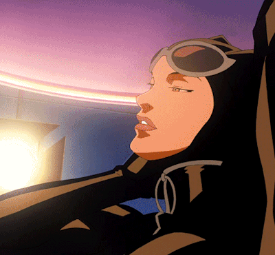 animated, batman (series), batman: year one, black clothing, black gloves, bodysuit, braless, breasts, catwoman, catwoman (year one), cleavage, clothed female, dc, dc comics, exhibitionism, female, femme fatale, gloves, goggles on head, large breasts, latex, leather, navel, official animation, official art, seductive, selina kyle, shorter than 30 seconds, solo, solo focus, stage, stripper, stripping, striptease, teasing, undressing, undressing self, unzipped, unzipped bodysuit, zipper
