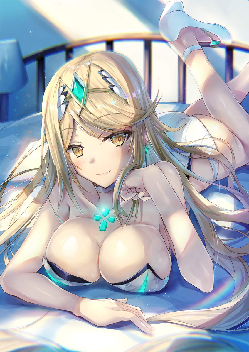 1girls ass blonde_hair blush cleavage inoue_takuya_(pixiv_99697) large_breasts legs_up long_hair mythra_(xenoblade) nintendo on_bed on_stomach smile solo xenoblade_(series) xenoblade_chronicles_2