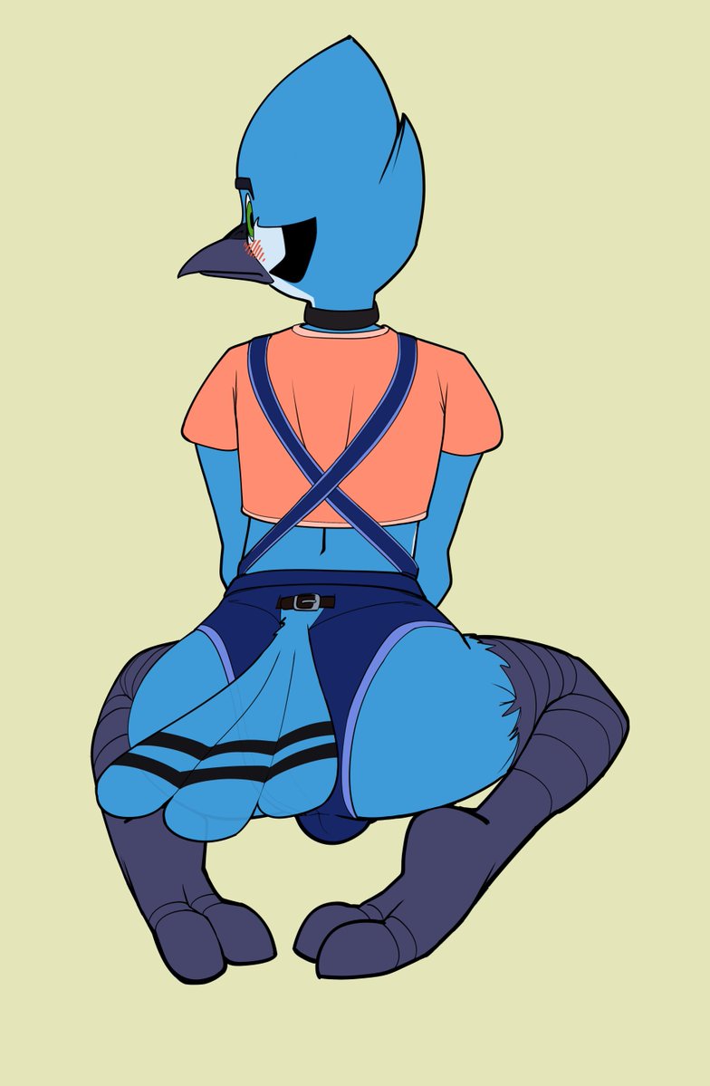 2021 anthro ass avian beak big_butt bird blue_jay blush bottomwear bulge cartoon_network choker clothed clothing corvid crop_top eyebrows feathers femboy furgonomics girly hotpants inkgelato jay_(bird) jewelry kneeling looking_back male male_only mordecai_(regular_show) necklace new_world_jay oscine overalls passerine rear_view regular_show shirt shorts simple_background solo tail_clothing topwear white_background