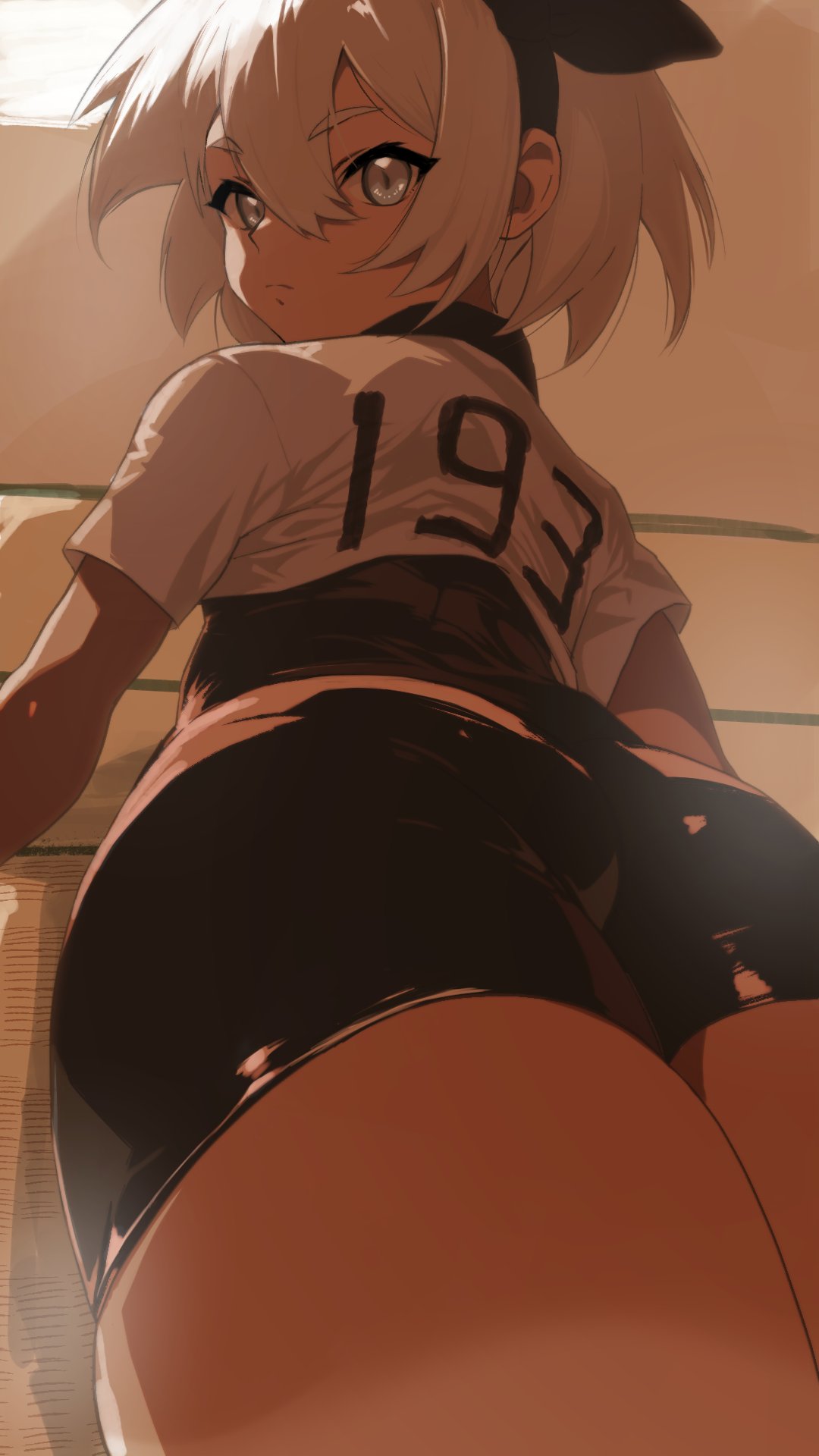 ahonoko, ass, ass focus, bea (pokemon), black bodysuit, black hairband, black shorts, bodysuit, bodysuit under clothes, commentary request, dark skin, dark-skinned female, expressionless, female, female only, from behind, grey eyes, grey hair, hair between eyes, hairband, highres, looking at viewer, looking back, nintendo, pokemon, pokemon ss, pokemon swsh, shirt, short hair, shorts, solo, thighs, upper body, white shirt