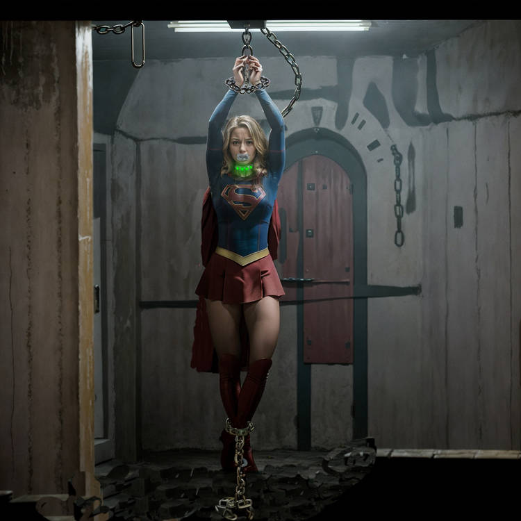 ankle_cuffs arms_above_head arms_tied arms_up blonde_hair bondage celebrity chained costume dc dc_comics defeated defeated_heroine deviantart helpless kara_danvers kara_zor-el kryptonite melissa_benoist mouth_gag skirt supergirl supergirl_(cw) supergirl_(series) superhero superheroine tied_up vulnerable