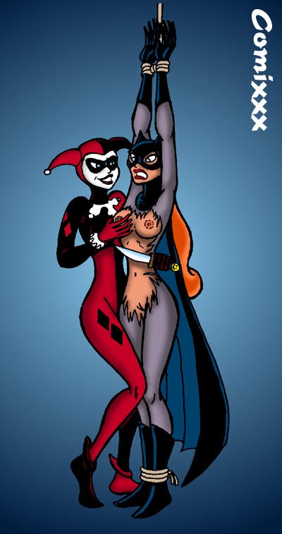 2girls angry animal_ears arms_up artist_request barbara_gordon bat_ears batgirl batman:_the_animated_series batman_(series) blue_background blue_eyes bodysuit bondage boots bound_legs bound_wrists breast_grab breasts cape captured captured_heroine clenched_teeth comixxx damsel_in_distress dc dc_comics dcau defeated_heroine evil_grin evil_smile eyes female female_only femdom footwear full_body ginger_hair gloves grin groping groping_breasts happy harley_quinn harley_quinn_(classic) headgear helpless heroine human jester_hat jester_outfit knife knifepoint lezdom lezsub lipstick long_gloves mask medium_breasts melee_weapon multiple_females multiple_girls nipples open_eyes open_hands plain_background pussy red_clothing red_lipstick ripped_clothing rope rope_bondage shoes side_view slim_waist smile standing superheroine supervillainess tagme teeth teeth_clenched tied_up tied_wrists torn unhappy_female villainess watermark weapon yuri