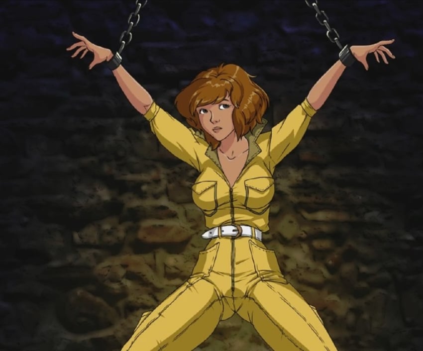 1girls april_o'neil april_o'neil_(tmnt_1987) belt bondage brown_hair chains clothed female femsub feodosiy restrained short_hair solo teenage_mutant_ninja_turtles tmnt_1987 wrist_cuffs