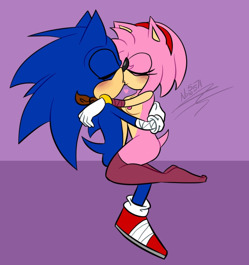 1boy 1boy1girl 1girl amy_rose bandages bandages_around_wrists blue_fur breasts embrace eyes_closed gloves headband kissing neck_band neck_wraps nino5571 ninotrash pink_fur running_shoes sega sonic_(series) sonic_boom sonic_the_hedgehog straddle straddling straddling_lap thighhighs thighs