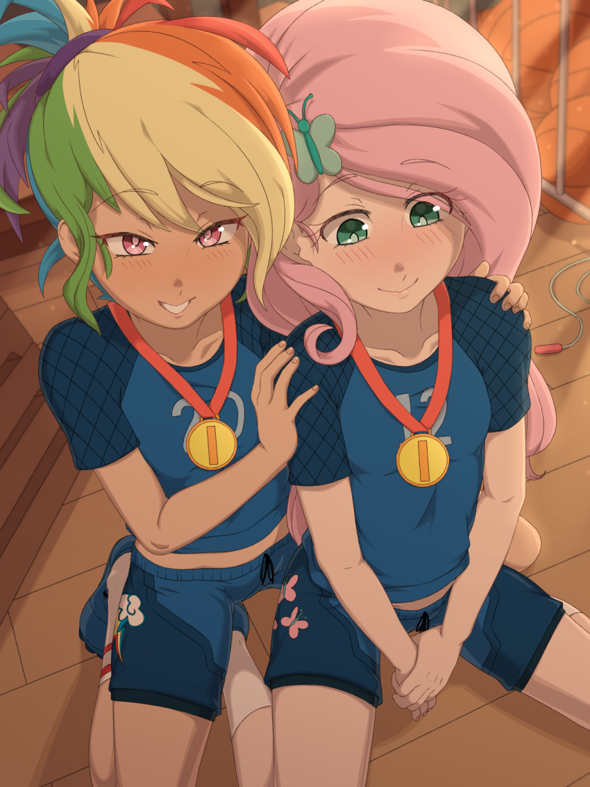 2girls blush equestria_girls fluttershy_(mlp) friendship_is_magic green_eyes gym gym_uniform long_hair looking_at_viewer looking_down my_little_pony pink_hair rainbow_dash_(mlp) rainbow_hair red_eyes rockset short_shorts shorts