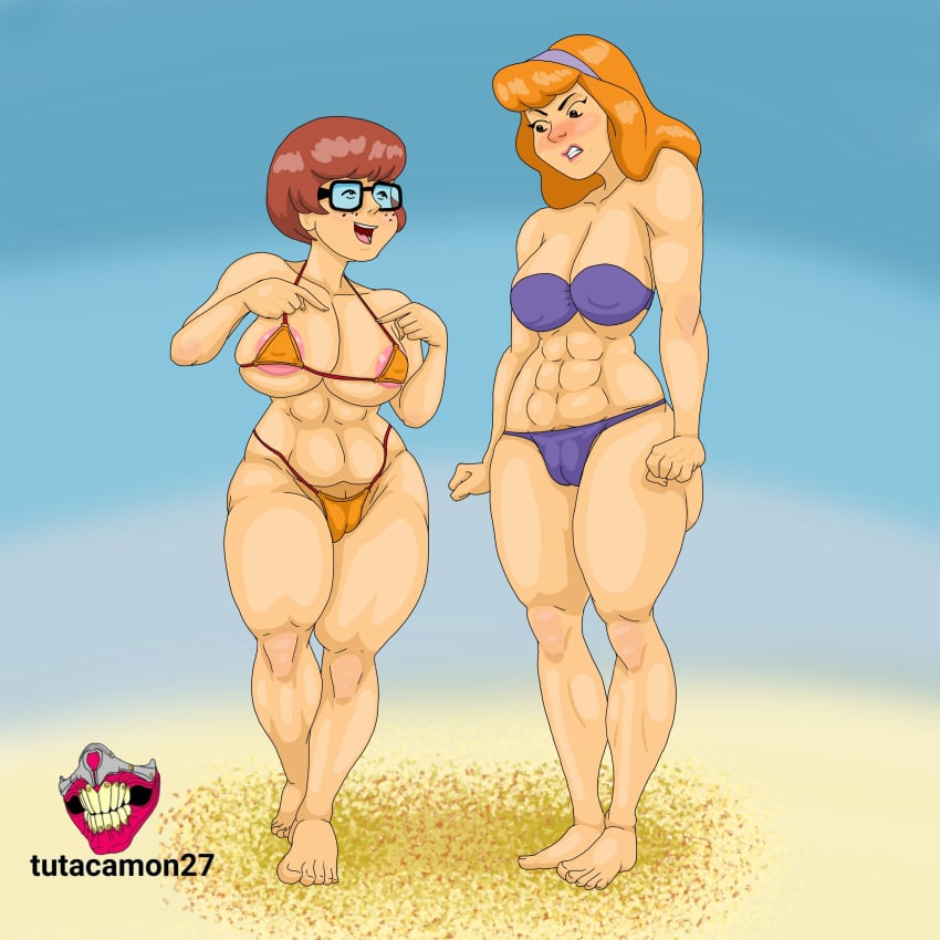 2girls abs beach beach_background bikini brown_hair curvaceous curvaceous_figure curvaceous_thighs curvy_females curvy_figure curvy_hips daphne_blake defined_muscles female glasses multiple_girls orange_bikini orange_hair purple_bikini scooby-doo scooby-doo_(series) shaved_pussy signature skindentation text tutacamon27 velma_dinkley voluptuous voluptuous_female