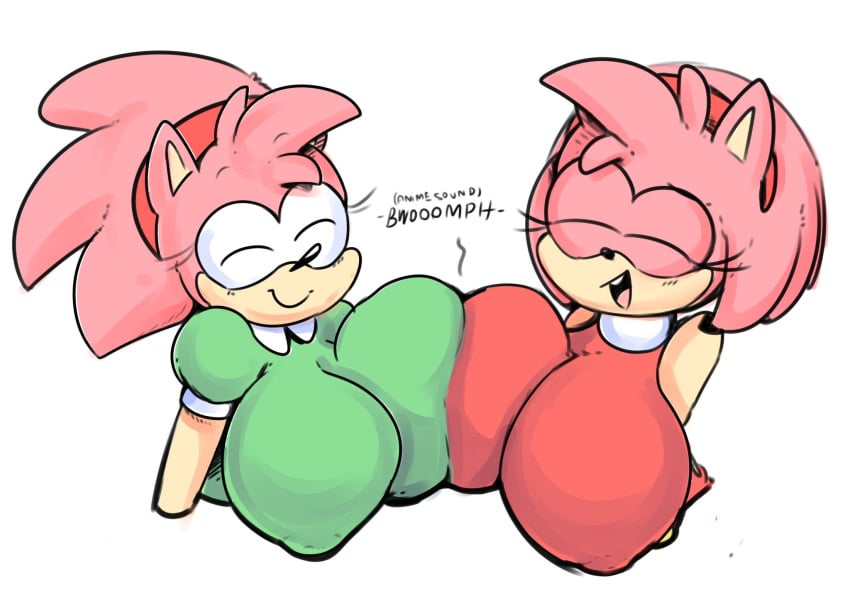 2girls amy_rose big_breasts breast_press classic_amy_rose elchilenito eyelashes eyes_closed female female_only green_shirt huge_breasts multiple_girls pink_fur pink_hair pink_skin red_headband red_shirt sonic_(series) tan_skin text