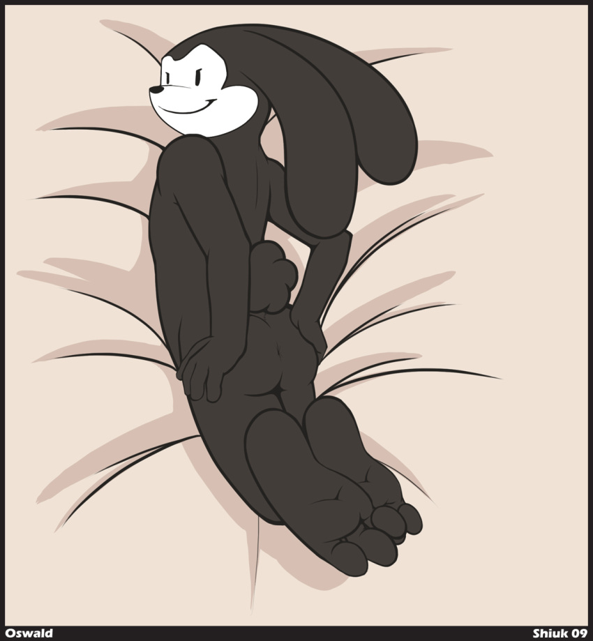 above_view anthro ass black_fur disney lying male male_only nude on_front oswald_(character) oswald_the_lucky_rabbit solo tagme toony