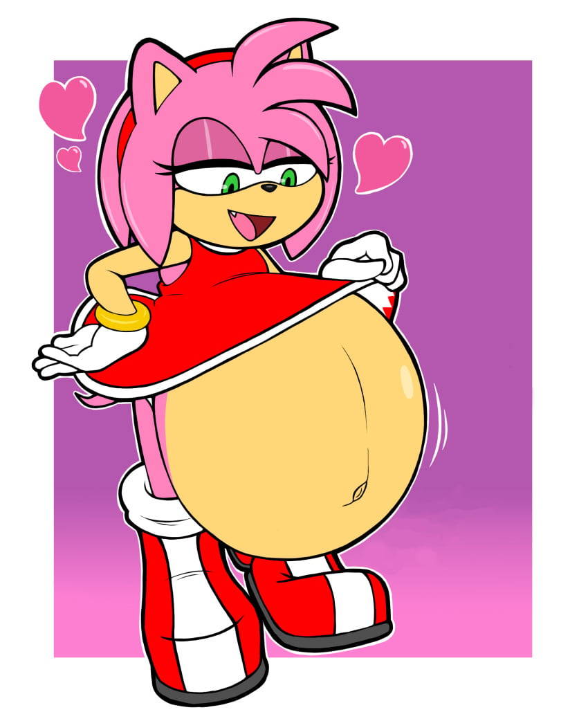 amy_rose boots color colored dress edit edited exposed_belly fang fetal_movement gael2000 green_eyes heart hedgehog huge_belly mobian_(species) no_shading outie_navel pink_fur pregnant red_boots red_dress rings_on_arms simple_background sonic_(series) sonic_the_hedgehog_(series) tiara velkno