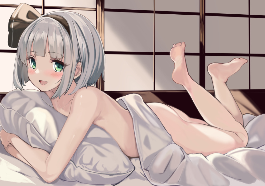 1girls :d ass barefoot black_bow black_hairband blush bow collarbone commentary_request completely_nude crossed_arms eyelashes feet feet_up fuji_norihiro full_body green_eyes grey_hair hairband hairbow happy hugging_object indoors konpaku_youmu legs looking_at_viewer lying medium_hair nude on_bed on_stomach open_mouth pillow pillow_hug smile soles solo the_pose toes touhou youmu_konpaku