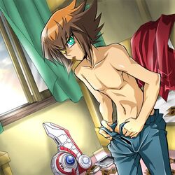 bed bedroom brown_hair cards clothed green_eyes human indoors jaden_yuki male male_only navel pants shirtless solo tagme yellow_eyes yu-gi-oh! yu-gi-oh!_gx