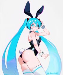 axolloid blue_eyes blue_hair bunny_ears bunny_tail bunnysuit hair_ornament hatsune_miku looking_at_viewer microphone stockings very_long_hair vocaloid wristband