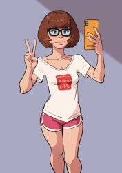 1girl atomicrailgun brown_hair cleavage cute cute_face female glasses mirror_selfie peace_sign phone scooby-doo shirt short_hair shorts small_breasts solo velma_dinkley