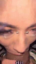 blowjob dark-skinned_male female looking_at_viewer male piercing tagme tongue_out video