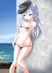 :o against_wall anchor_symbol arm_at_side bangs bikini black_hat black_swimsuit blue_bra blue_eyes blurry blush breasts cloud collarbone commentary_request day depth_of_field eyebrows_visible_through_hair female fingering flat_cap groin half-closed_eyes halterneck hand_in_swimsuit hat hibiki_(kantai_collection) highres horizon kantai_collection kaze_makase knees_together_feet_apart long_hair looking_down masturbation micro_bikini navel ocean open_mouth outdoors sidelocks silver_hair skindentation sky small_breasts solo standing stomach string_bikini swimsuit torogao underboob very_long_hair