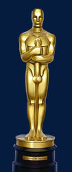 1boy artist_request balls erect_penis erection human hyper_penis male male_only muscular muscular_male oscar_(award) oscars_(ceremony) penis solo