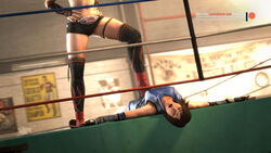 2girls 3d absurdres blonde_hair boots brown_hair dead_or_alive dead_or_alive_5 defeated femdom foot_on_stomach hands_on_hips highres kazama_asuka pinned ropes tekken tekken7wallpapers tekken_7 tina_armstrong unconscious wrestling_ring