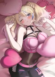 bed bed_sheet bedroom blonde_hair blue_eyes breasts corset heart kiddycorky large_breasts nail_polish pillow shorts skinsuit twintails virtual_youtuber