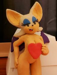 1girls clay_(medium) covering_breasts female female_only hand_on_hip heart lewsklay looking_at_viewer nude rouge_the_bat smile solo solo_female sonic_(series) traditional_media_(artwork)