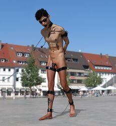 1boy 3d ankle_cuffs arm_cuffs arms_behind_back ball_gag barefoot blindfold bondage chastity chastity_cage collar cuffs gag gamestiedup humiliation leash male male_only malesub nipple_weights nude penis public_nudity slave thigh_cuffs weights_(bdsm) wrist_cuffs