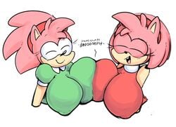 2girls amy_rose big_breasts breast_press classic_amy_rose elchilenito eyelashes eyes_closed female female_only green_shirt huge_breasts multiple_girls pink_fur pink_hair pink_skin red_headband red_shirt sonic_(series) tan_skin text