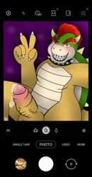 anthro belly blush blush_lines bodily_fluids bowser budpup cellphone claws collar cum english_text foreskin genital_fluids genitals gesture hair hi_res king koopa male male_focus male_only male_solo mario_(series) nintendo nude penis phone photo presenting presenting_penis red_eyes red_hair royalty scales scalie selfie sharp_claws sharp_teeth shell smile smiling_at_viewer solo solo_male spiked_collar spiked_penis spiked_shell spikes spikes_(anatomy) teeth text uncircumcised v_sign video_games