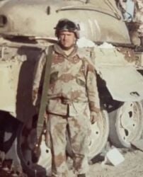 assault_rifle camouflage desert_camouflage gulf_war gun helmet larry_graves lowres military_combat_uniform military_uniform military_vehicle motor_vehicle non-web_source off-topic photo_(medium) rifle tank united_states_marine_corps weapon