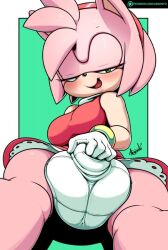 amy_rose anthro argento big_balls blush border bulge bulge_grab clothed clothing dress fully_clothed furry futa_only futanari genitals gloves green_eyes hairband handwear narrowed_eyes solo sonic_(series)