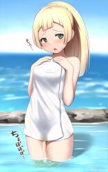 arisu_kazumi blonde_hair blush braid braided_hair covered_body embarrassed game_freak green_eyes japanese_text lillie_(pokemon) nintendo ocean peeing pokemon pokemon_sm ponytail sweatdrop towel