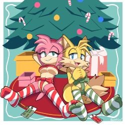 amy_rose blue_eyes both_sexes_in_same_situation breasts christmas christmas_outfit christmas_present christmas_tree erection fox gift_wrapped green_eyes hedgehog implied_yaoi ribbon senshion sitting sonic_(series) sonic_the_hedgehog_(series) stockings tails wrapped yaoi