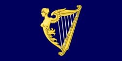 1girls artistic_nude big_breasts blue_background breasts exposed_breasts female female_only flag gold_(metal) gold_skin harp hi_res ireland irish irish_flag nipples official_art unknown_artist wings