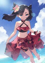 1girls beach bikini black_hair blue_eyes bracelet breasts clouds female hair_flower in_water kin_niku looking_at_viewer marnie_(pokemon) midriff navel nintendo ocean outside pokemon pokemon_masters pokemon_ss red_bikini red_swimsuit sarong sky slender_legs small_breasts solo summer_marnie_(pokemon_masters) swimsuit thighs twintails water