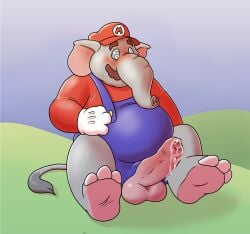 anthro balls blueballs_(artist) blush bodily_fluids clothed clothing digital_media_(artwork) elephant elephant_mario elephantid genital_fluids genitals hair hat headgear headwear hi_res humanoid_genitalia humanoid_penis hypnotic_eyes male male_only mammal mario mario_(series) nintendo nipples overweight partially_clothed penis proboscidean simple_background solo super_mario_bros._wonder trunk tusks