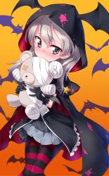 bat blonde_hair blush boko_(girls_und_panzer) cape closed_mouth female girls_und_panzer grey_eyes halloween holding_stuffed_toy hoodie kuzuryuu_kennosuke long_hair looking_at_viewer pantyhose shimada_arisu smile solo striped_pantyhose stuffed_toy